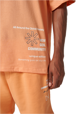GLOBAL COMMUNITY- SOFT ORANGE